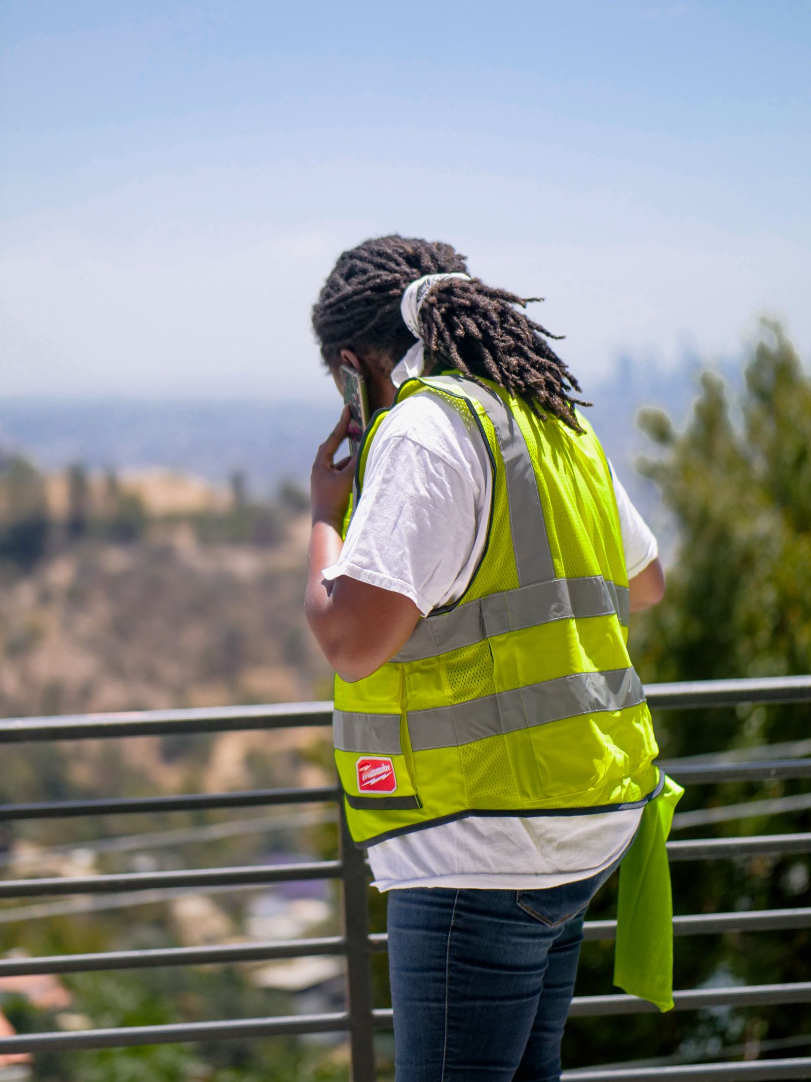 Contractor on a phone call at a job site