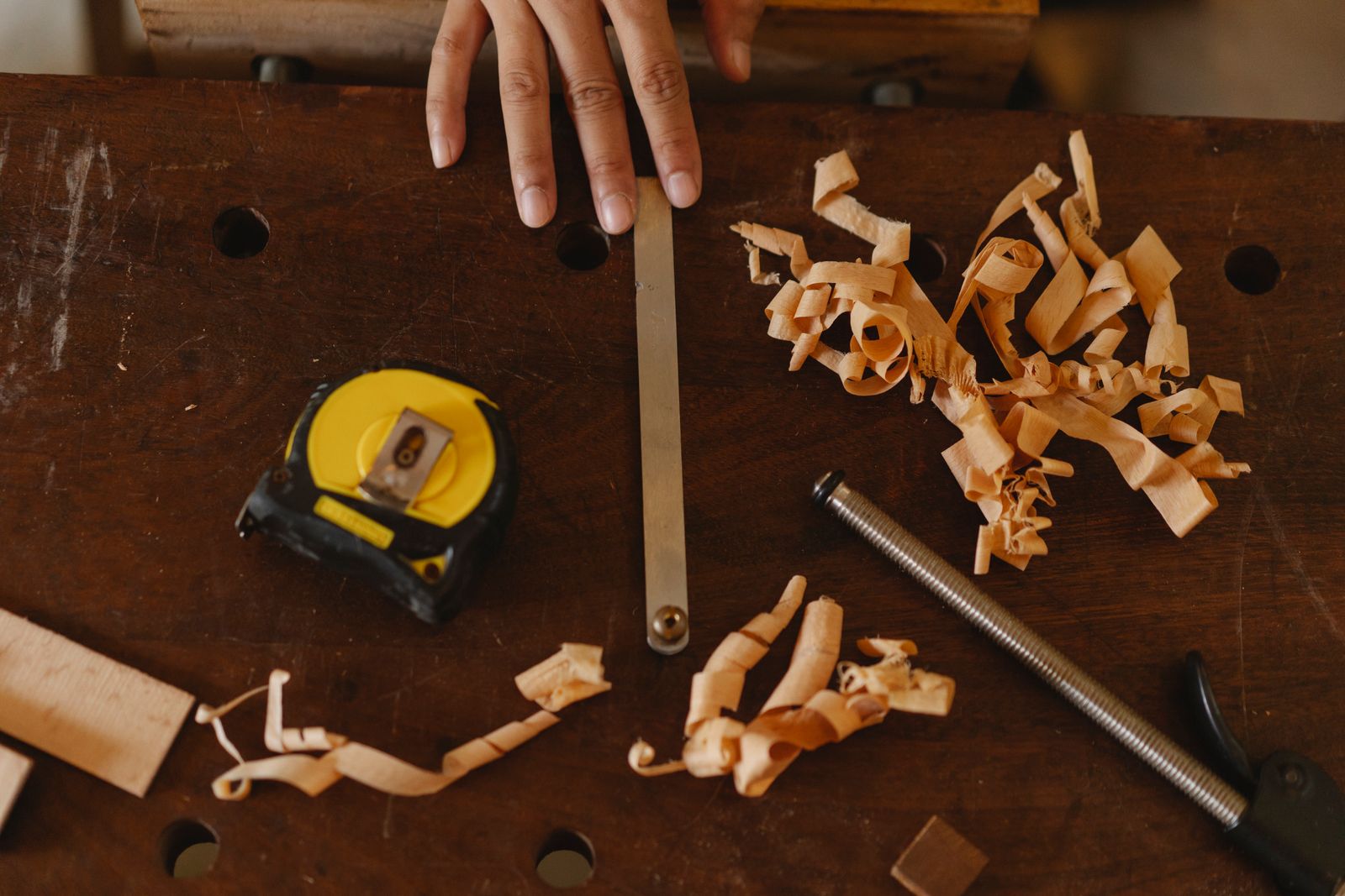 Carpenter workbench with lumber and tools